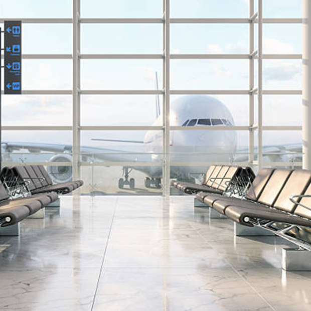 Airport gate seating looking out at an airplane